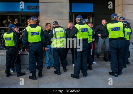 London, UK. 15th October 2013. Police perform stop and search procedures on Polish fans at Westminster prior to tonight's World Cup game with England. Westminster, London, UK 15 Oct 2013. Credit:  Guy Bell/Alamy Live News Stock Photo