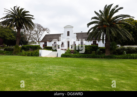 A typical Cape Dutch house on a wine farm in the Cape South Africa Stock Photo