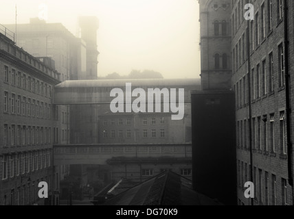 A foggy day at Dean Clough Mills, Halifax, West Yorkshire, UK. Stock Photo