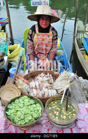 Boat vendor at the Hatyai's Klong Hae Floating Market in Southern Thailand Stock Photo