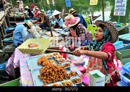 Boat vendors at the Hatyai's Klong Hae Floating Market in Southern Thailand Stock Photo