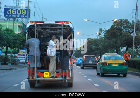 Thailand songthaew taxi and a taxi meter car in Bangkok. Stock Photo