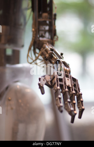 Future technology in black prosthetic hand with a blurred backgound Stock Photo