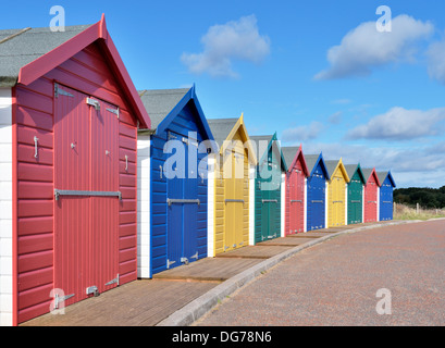 Colored bathing huts along english promenade Stock Photo