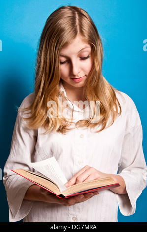 teenager girl reading book isolated over white background Stock Photo ...