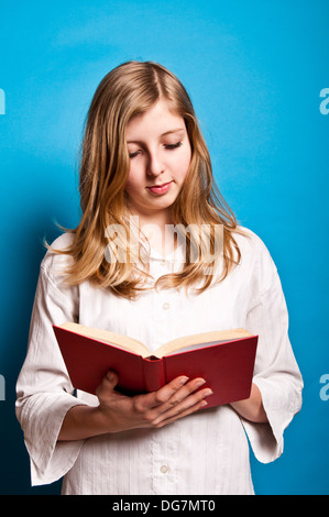 teenager girl reading book isolated over white background Stock Photo ...