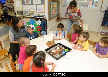 Israeli 3 year old children in a kindergarten Stock Photo