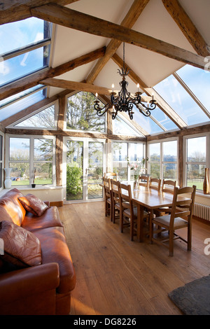 An Orangery type conservatory interior of a house with oak frame, in Stroud, England,UK. Stock Photo