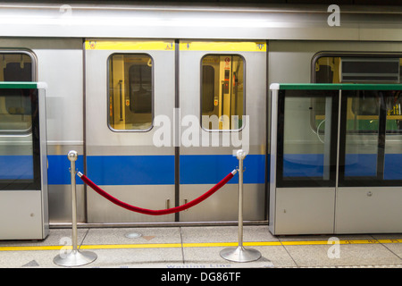 MRT with red rope barrier in front of the closed doors Stock Photo