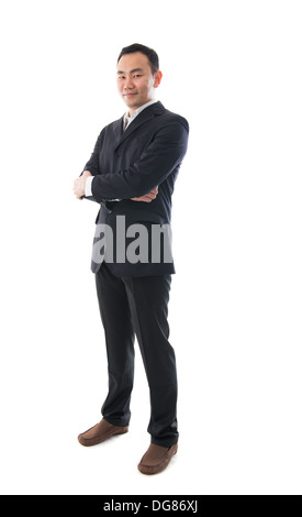 Full body Asian business man sitting on a chair over white background ...