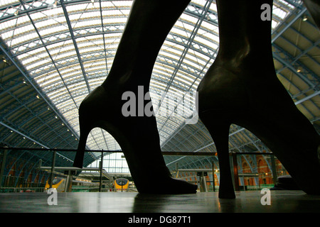 The Meeting Place Statue, St Pancras Station, London. set at the south end of the upper level of the station Stock Photo
