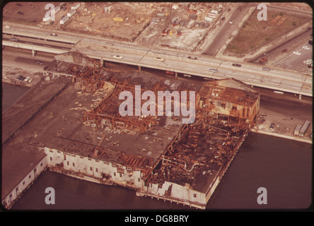 DISUSE AND AGE ROT OLD WAREHOUSES AND SHIP TERMINALS ON THE HUDSON RIVER. ALONGSIDE IS THE WEST SIDE HIGHWAY, A MAJOR... 548367 Stock Photo