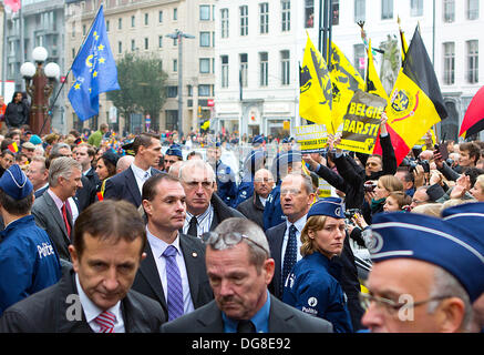 Gent, Belgium. 16th October 2013. Demonstration and King Philippe (R) - Filip of Belgium pictured during the 'Joyous Entry - Blijde Intrede - Joyeuse Entree' of King Philippe and Queen Mathilde to present themselves to the public in the different provincial capitals, today in Gent, Wednesday 16 October 2013 Photo: Albert Nieboer/dpa/Alamy Live News Stock Photo