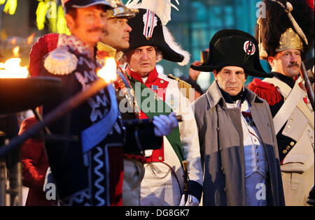Leipzig, Germany. 16th Oct, 2013. Actors dressed as Napoleon Bonaparte (2-R) and Frederick Augustus III of Saxony (C) stand during a muster of the guard of honor of the Saxonian grenadiers during the opening event of the reenactment of the Battle of Nations in Leipzig, Germany, 16 October 2013. On Sunday 20 October 2013, more than 6,000 participants will reenact the battle of 1813 between the armies of Russia, Prussia, Austria, and Sweden. Photo: Jan Woitas/dpa/Alamy Live News Stock Photo