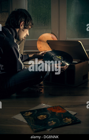 Playing vinyl records on a rainy day Stock Photo