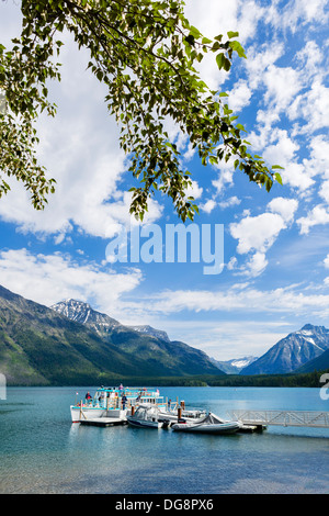 Cruise boat docked outside Lake McDonald Lodge, Lake McDonald, Glacier National Park, Montana, USA Stock Photo