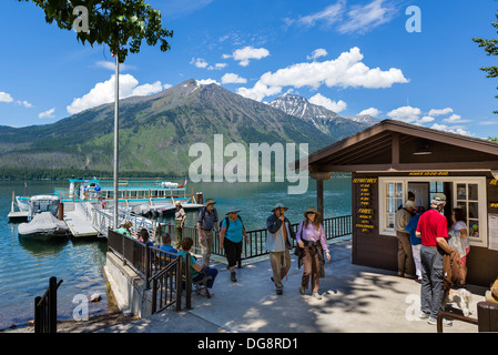 Passengers disembarking from cruise boat at Lake McDonald Lodge, Lake McDonald, Glacier National Park, Montana, USA Stock Photo