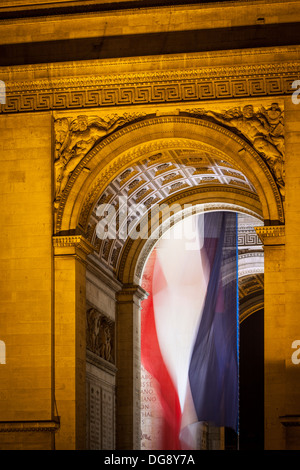 Flag flies inside the Arc de Triomphe, Paris France Stock Photo