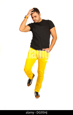 Full Length Of Fashionable Man In Black Tshirt And Yellow Pants Isolated On  White Background Stock Photo, Picture and Royalty Free Image. Image  22843689.