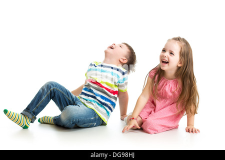 kids boy and girl laughing and looking up Stock Photo