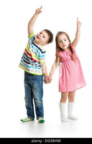 kids boy and girl showing something up Stock Photo