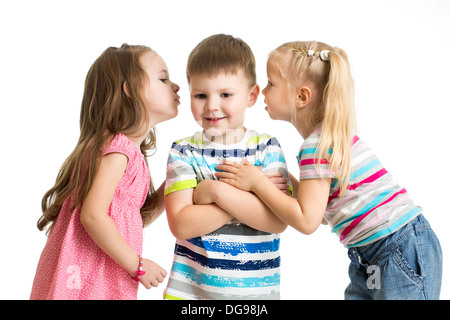 kids girls sharing a secret with boy isolated Stock Photo