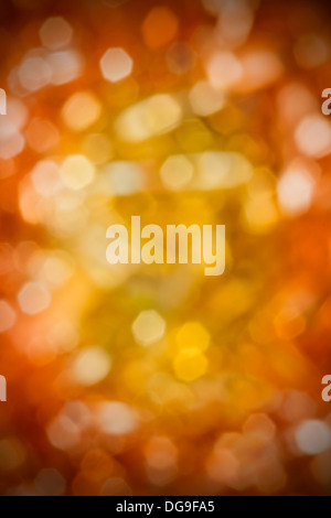 Abstract gold blurred lights christmas background with dark vignette Stock Photo
