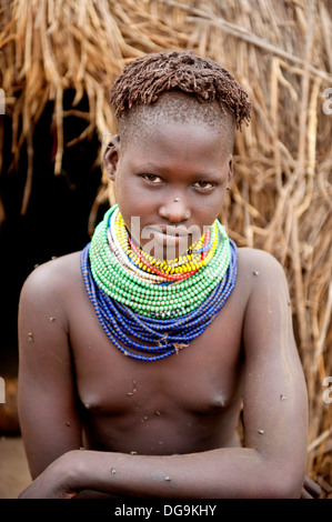 Nyangatom (Bumi) girl with piles of beads, Omo river Valley, Ethiopia ...