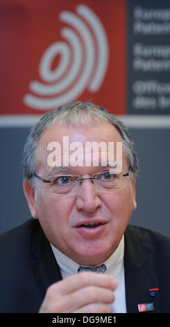 Munich, Germany. 17th Oct, 2013. The President of the European Patent Office, Benoit Battistelli, speaks at a press conference before the celebration of the 40th anniversary of the European Patent Convention at the European Patent Office in Munich, Germany, 17 October 2013. Photo: ANDREAS GEBERT/dpa/Alamy Live News Stock Photo