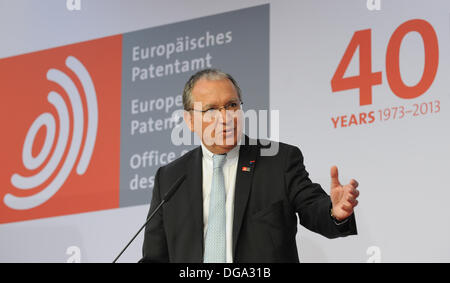 Munich, Germany. 17th Oct, 2013. The president of the European Patent Office, Benoit Battistelli, speaks at a symposium for the celebration of the 40 year anniversary of European Patent Convention in the European Patent Office in Munich, Germany, 17 October 2013. Photo: Andreas Gebert/dpa/Alamy Live News Stock Photo