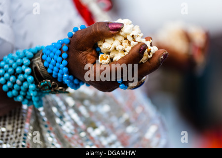 Hands of a Baiana woman seen during the Afro-Brazilian spiritual cleansing ritual performed in Salvador, Bahia, Brazil. Stock Photo