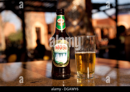 Mosi beer or lager, the local african brew named for Mosi Oa Tunya, the Victoria Falls, Zambia Africa Stock Photo