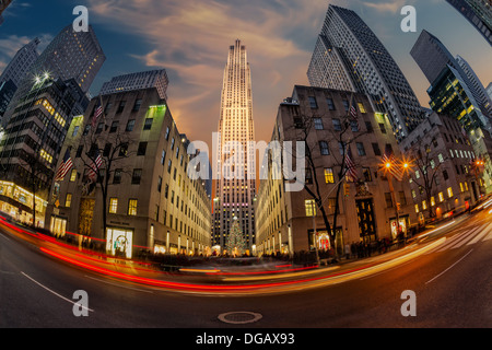 A fish eye view during sunset to Rockefeller Center with the decorated and illuminated iconic Christmas Tree. Stock Photo