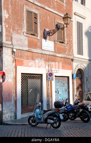 Street scene with vespas in Rome Italy Stock Photo