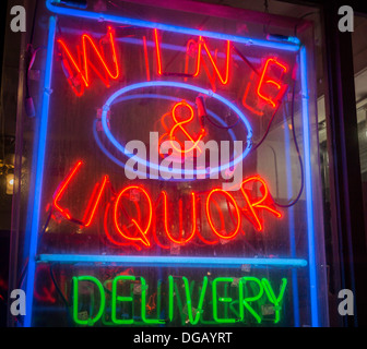 A liquor store's neon sign in the Tribeca neighborhood of New York, seen on Tuesday, October 15, 2013. (© Richard B. Levine) Stock Photo