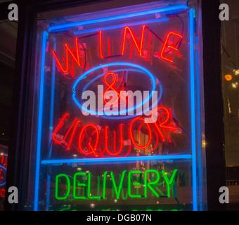 A liquor store's neon sign in the Tribeca neighborhood of New York, seen on Tuesday, October 15, 2013. (© Richard B. Levine) Stock Photo