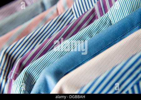 Various hanging men's shirts Stock Photo