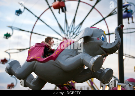 A boy enjoying an elephant ride at the Mountain State Fair in Asheville, North Carolina Stock Photo