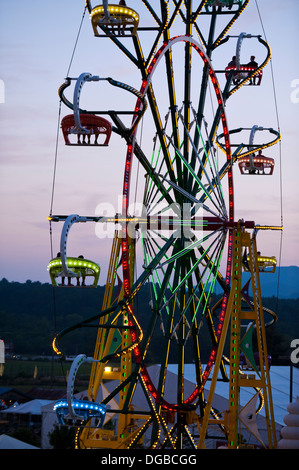 A carnival ride / Farris Wheel in action at the Mountain State Fair in Asheville, North Carolina Stock Photo