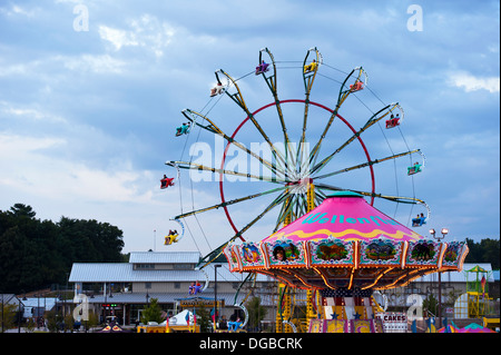 A carnival ride / Farris Wheel in action at the Mountain State Fair in Asheville, North Carolina Stock Photo