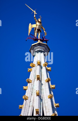 Sculpture on top of the Spire of Hotel De Ville in Grand Place, Brussels. Stock Photo