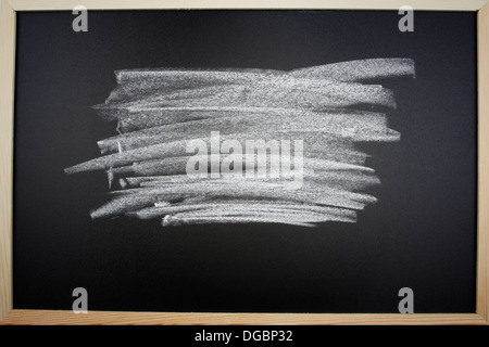 Rubbed out chalk on blackboard Stock Photo