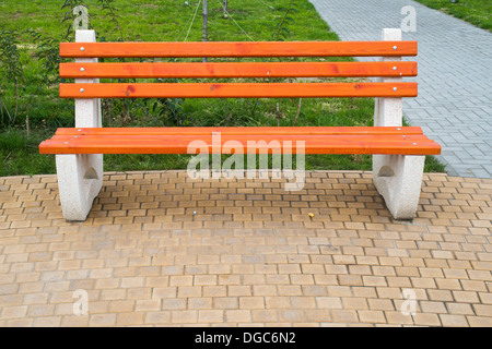 New wooden benches in a park Stock Photo