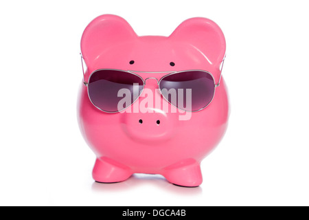 Saving for a holiday piggy bank studio cutout Stock Photo