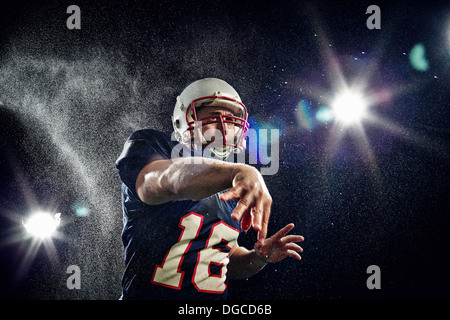 American footballer throwing Stock Photo