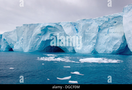 Icebergs amongst the ice floe in the southern ocean, 180 miles north of East Antarctica, Antarctica Stock Photo