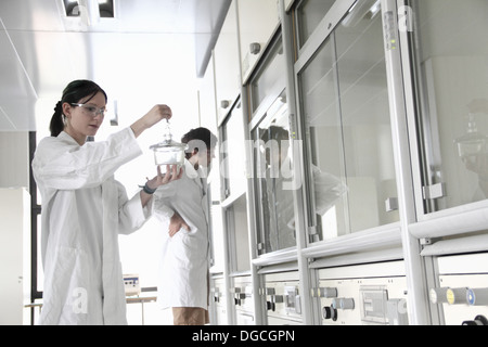 Chemistry students in laboratory Stock Photo