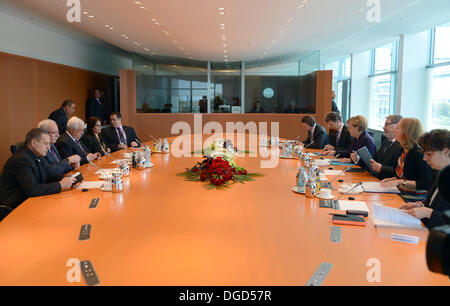 Berlin, Berlin, Germany. 17th Oct, 2013. Germany Chancellor Angela Merkel receives President of the State of Palestine Mahmoud Abbas in the Federal Chancellery in Berlin for bilateral meeting and Middle East peace process, on October 18, 2013 © Thaer Ganaim/APA Images/ZUMAPRESS.com/Alamy Live News Stock Photo