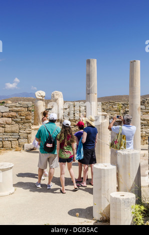 Tourists at the House of Cleopatra on Delos Island, Cyclades, Greece Stock Photo