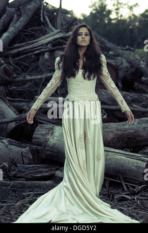 Woman in antique wedding dress Stock Photo